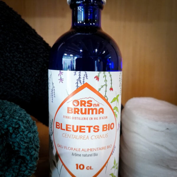 10cl d'eau florale alimentaire bio à base de Bleuets Bio en bouteille vue de face. Produite par Ors na Bruma
