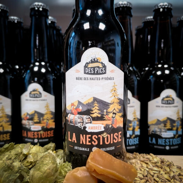 Photo vue de face d'une bière des Hautes-Pyrénées Ambrée La Nestoise produite par la brasserie des Pics